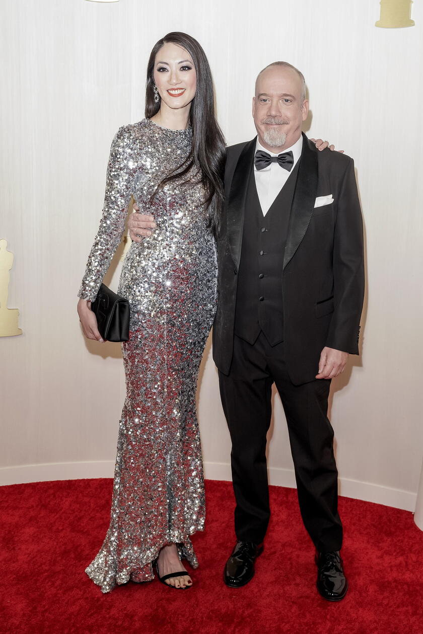 Arrivals - 96th Academy Awards -  Clara Wong e Paul Giamatti © ANSA/EPA